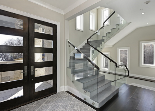 Tangga beton minimalis dengan balustrade kaca